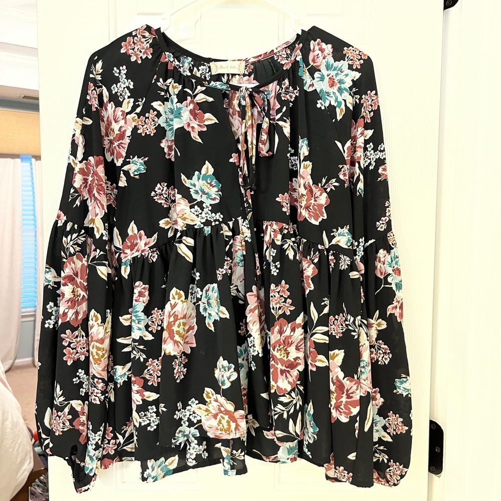 Altar’d State floral top with bell sleeves.